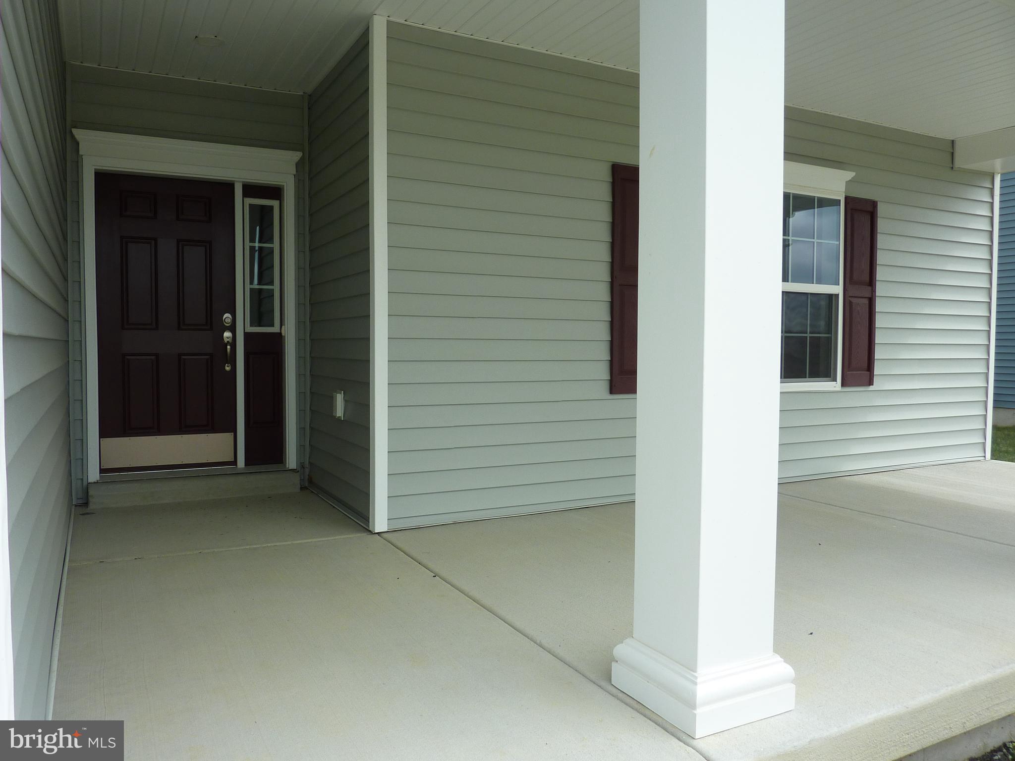 175 Villa Drive Clayton, DE 19938 - Photo 2 of 44 a view of front door