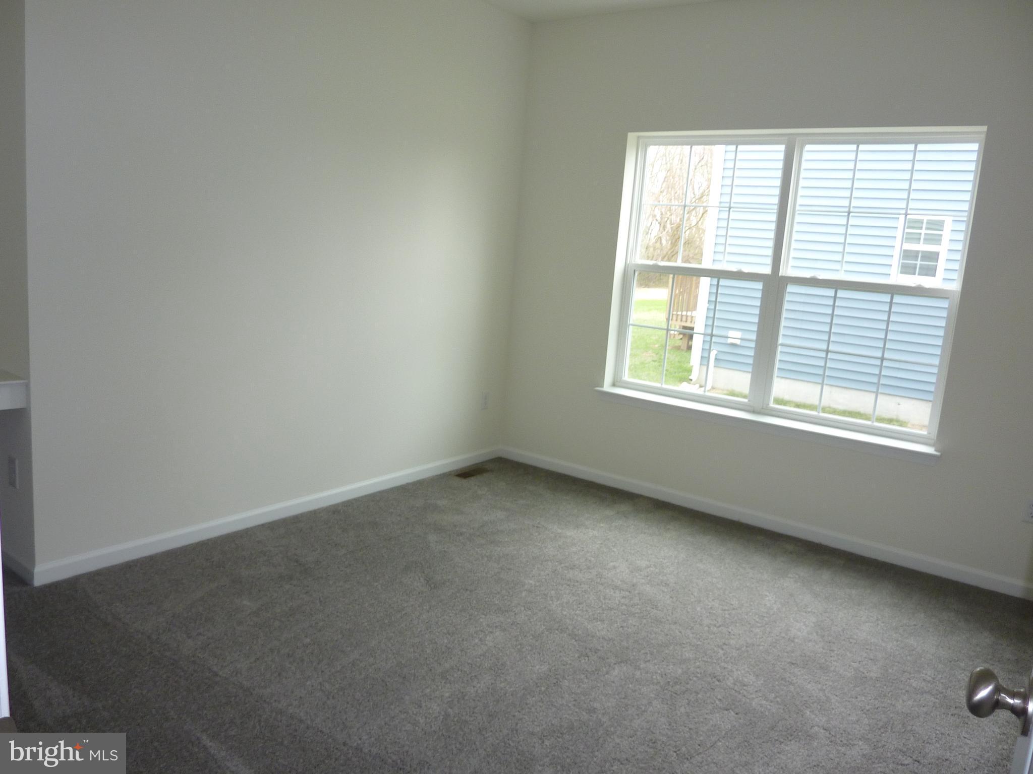 175 Villa Drive Clayton, DE 19938 - Photo 24 of 44 an empty room with a window