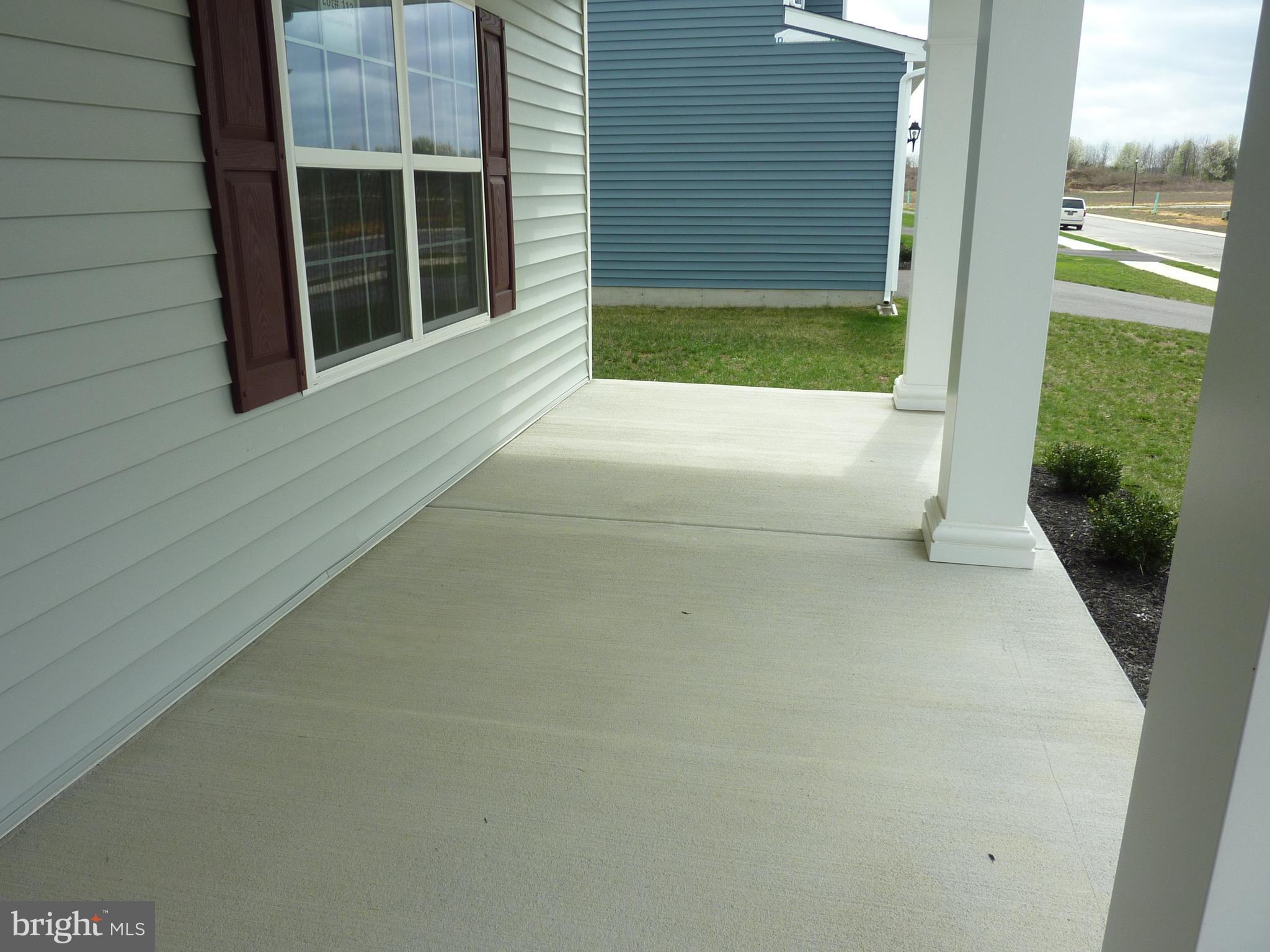 175 Villa Drive Clayton, DE 19938 - Photo 3 of 44 a view of entrance gate of the house