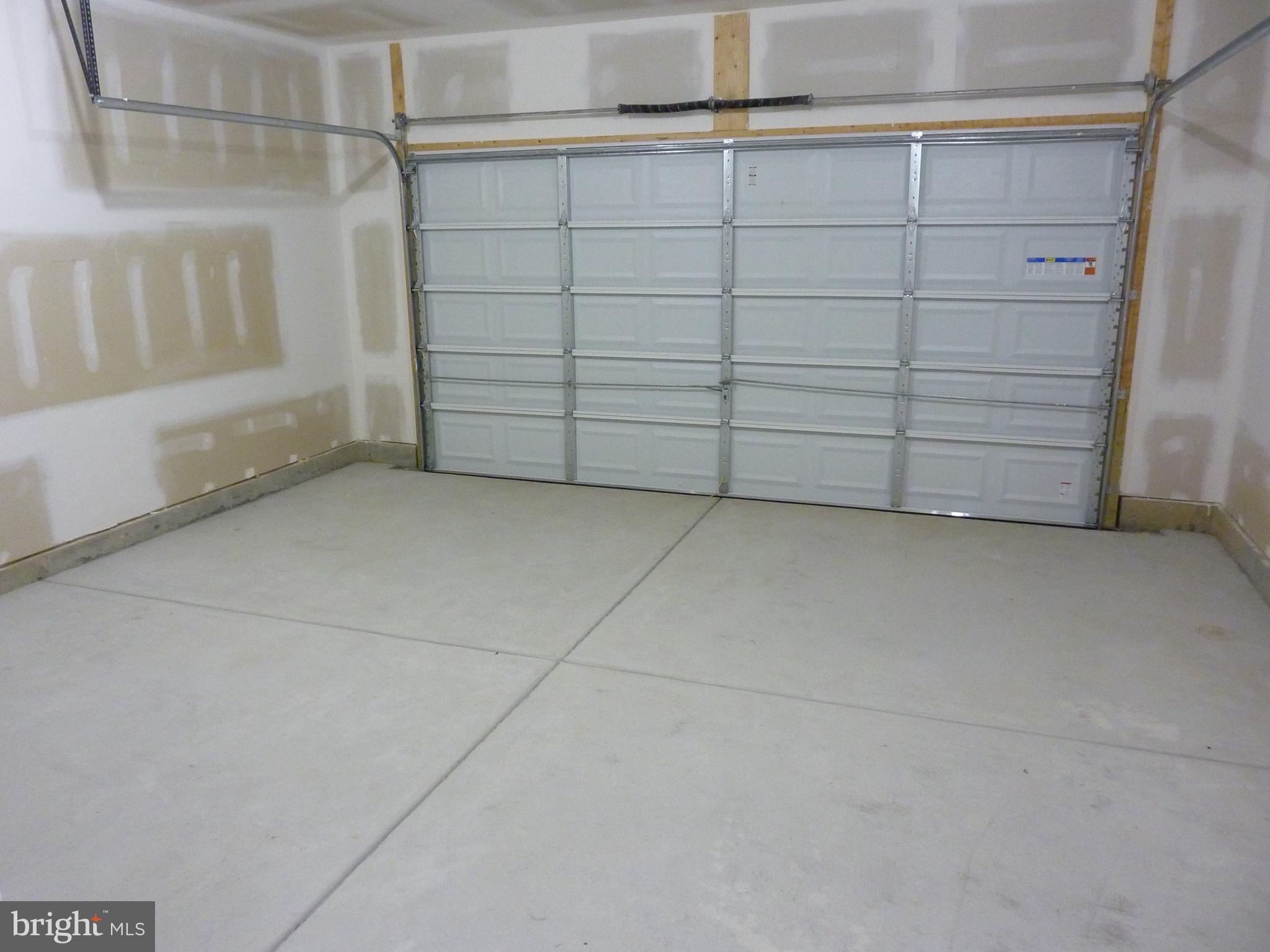 175 Villa Drive Clayton, DE 19938 - Photo 31 of 44 a view of a garage