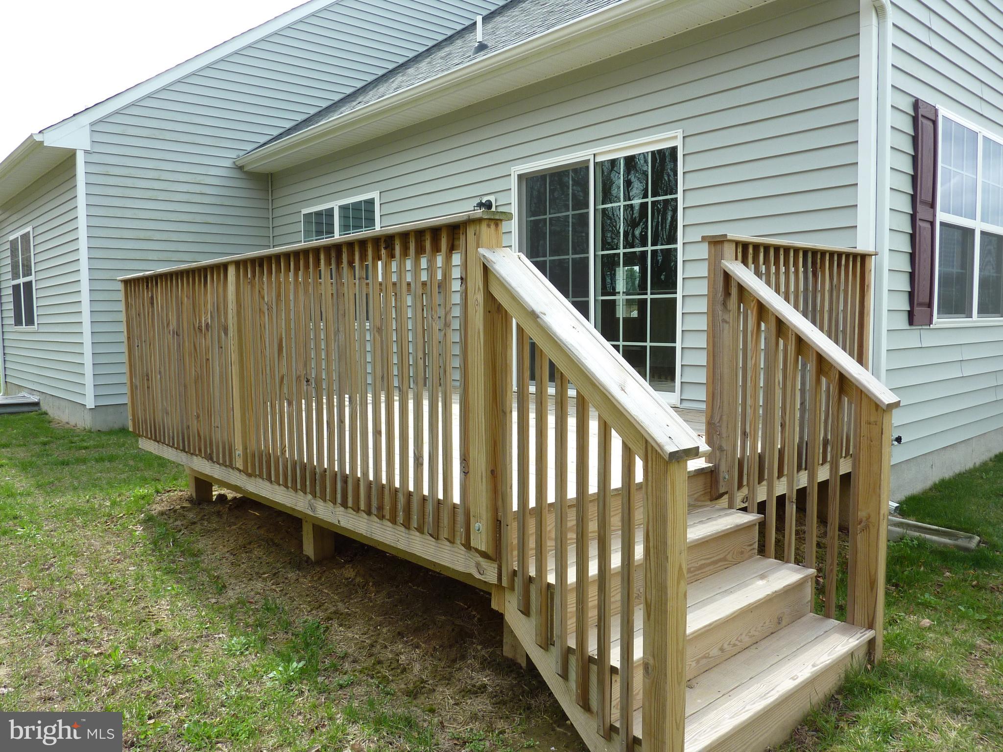175 Villa Drive Clayton, DE 19938 - Photo 40 of 44 a view of staircase with large window and wooden fence