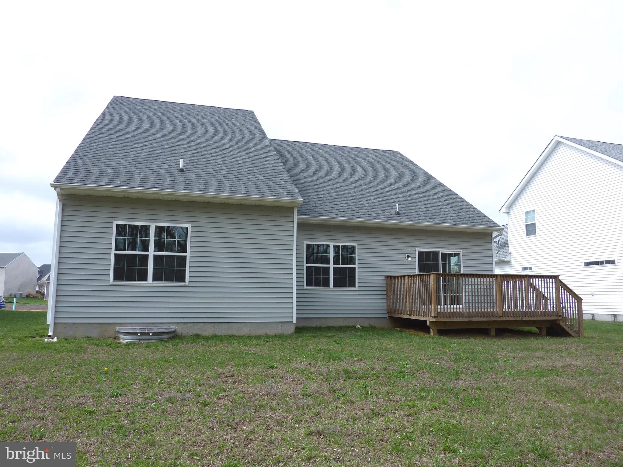 175 Villa Drive Clayton, DE 19938 - Photo 41 of 44 a front view of a house with garden