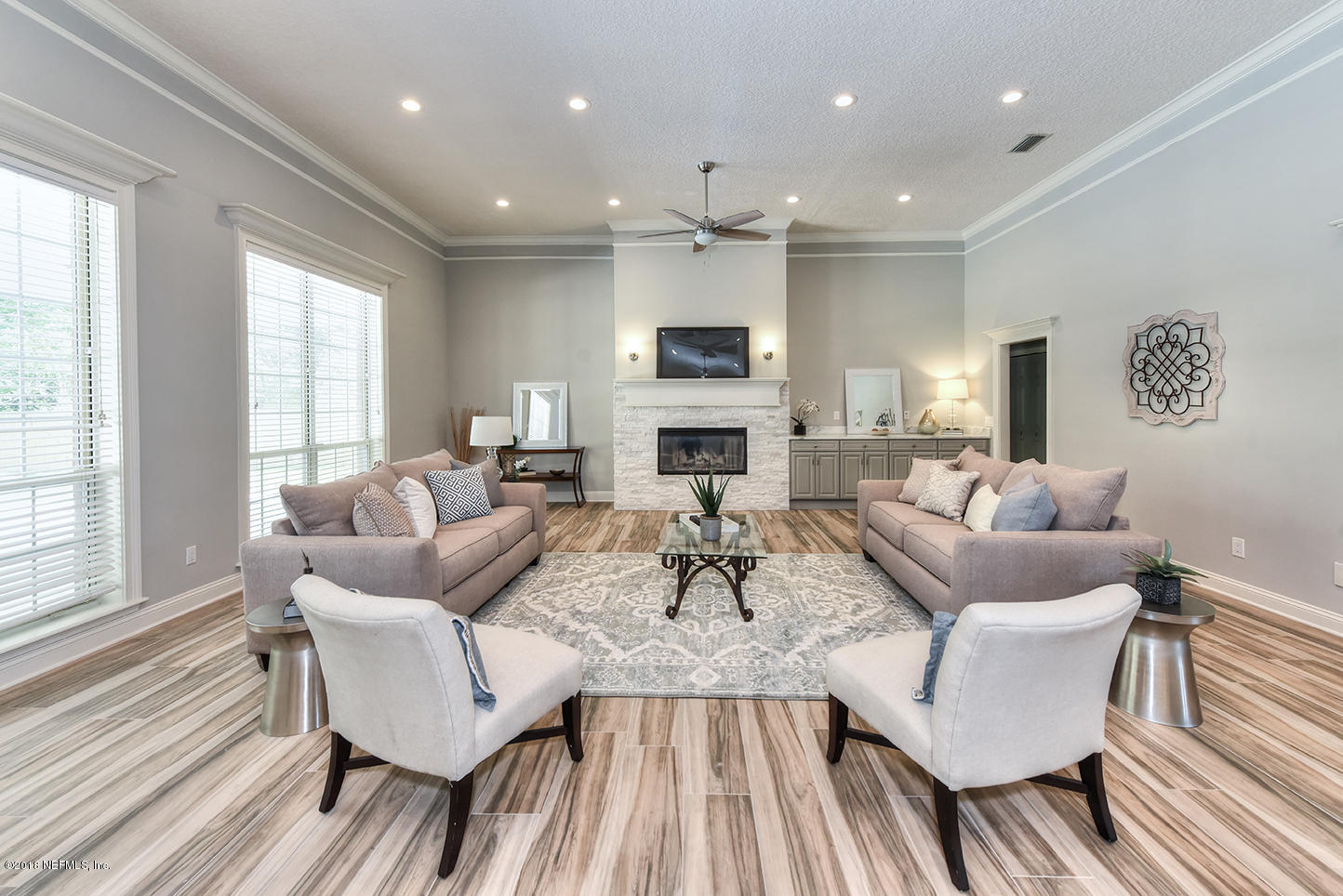 14511 Mandarin Road Jacksonville, FL 32223 - Photo 19 of 91 a living room with furniture and a fireplace