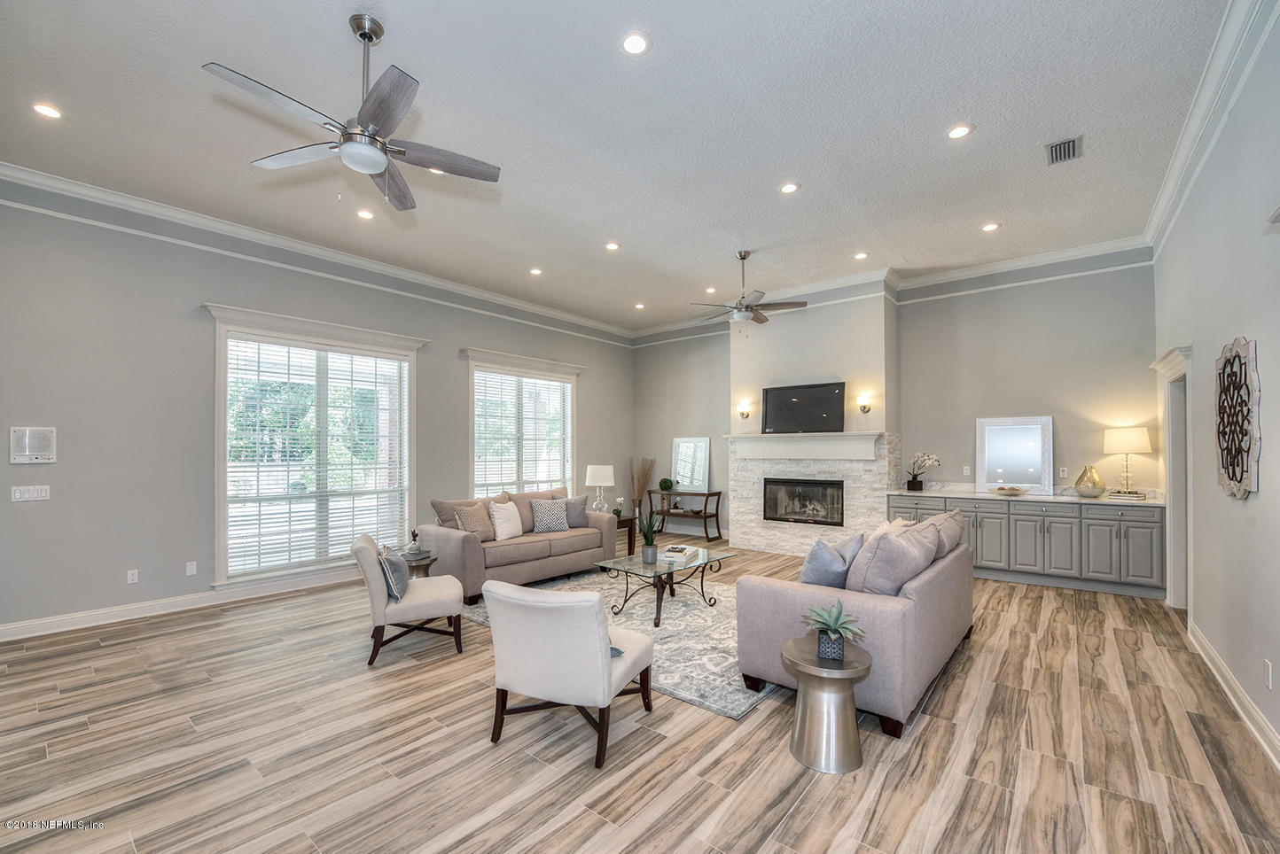 14511 Mandarin Road Jacksonville, FL 32223 - Photo 20 of 91 a living room with furniture and fireplace