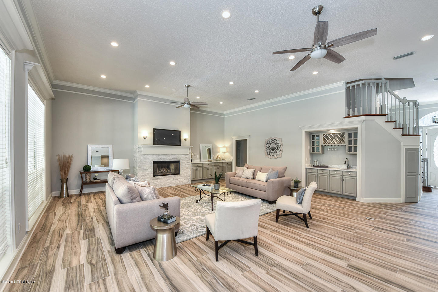 14511 Mandarin Road Jacksonville, FL 32223 - Photo 21 of 91 a living room with fireplace furniture and a wooden floor