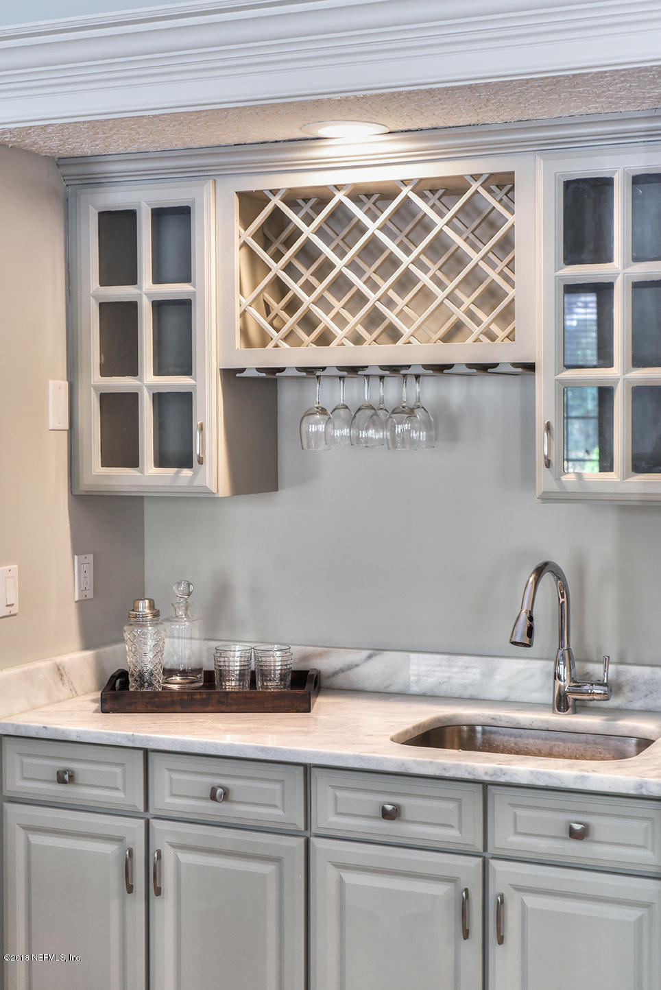 14511 Mandarin Road Jacksonville, FL 32223 - Photo 26 of 91 a kitchen with a sink and cabinets