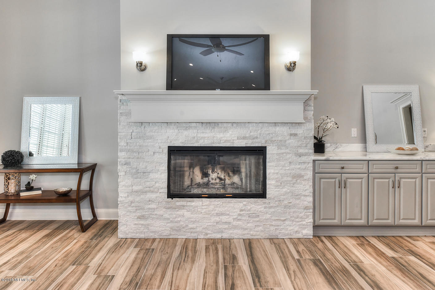 14511 Mandarin Road Jacksonville, FL 32223 - Photo 27 of 91 a living room with furniture and a fireplace