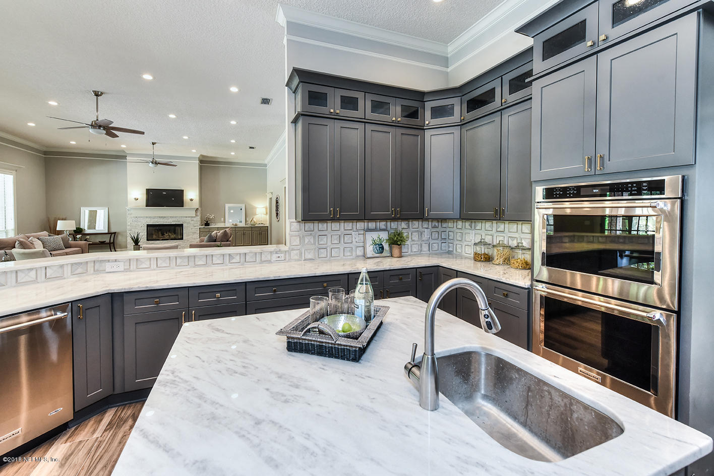 14511 Mandarin Road Jacksonville, FL 32223 - Photo 37 of 91 a kitchen with stainless steel appliances granite countertop a sink a stove and a microwave