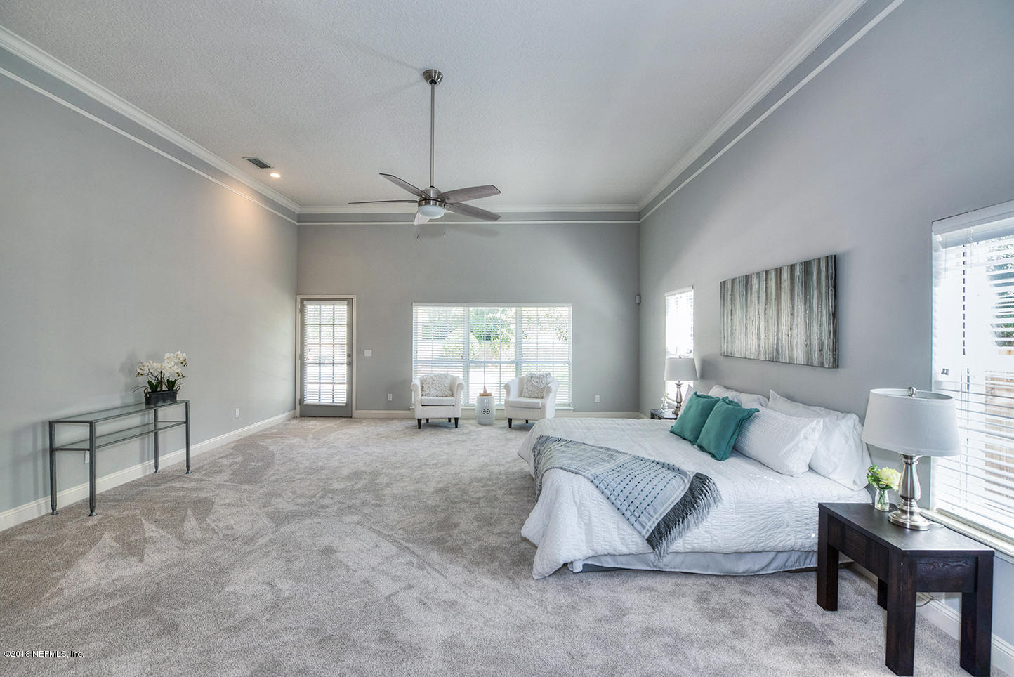 14511 Mandarin Road Jacksonville, FL 32223 - Photo 67 of 91 a living room with furniture and a chandelier