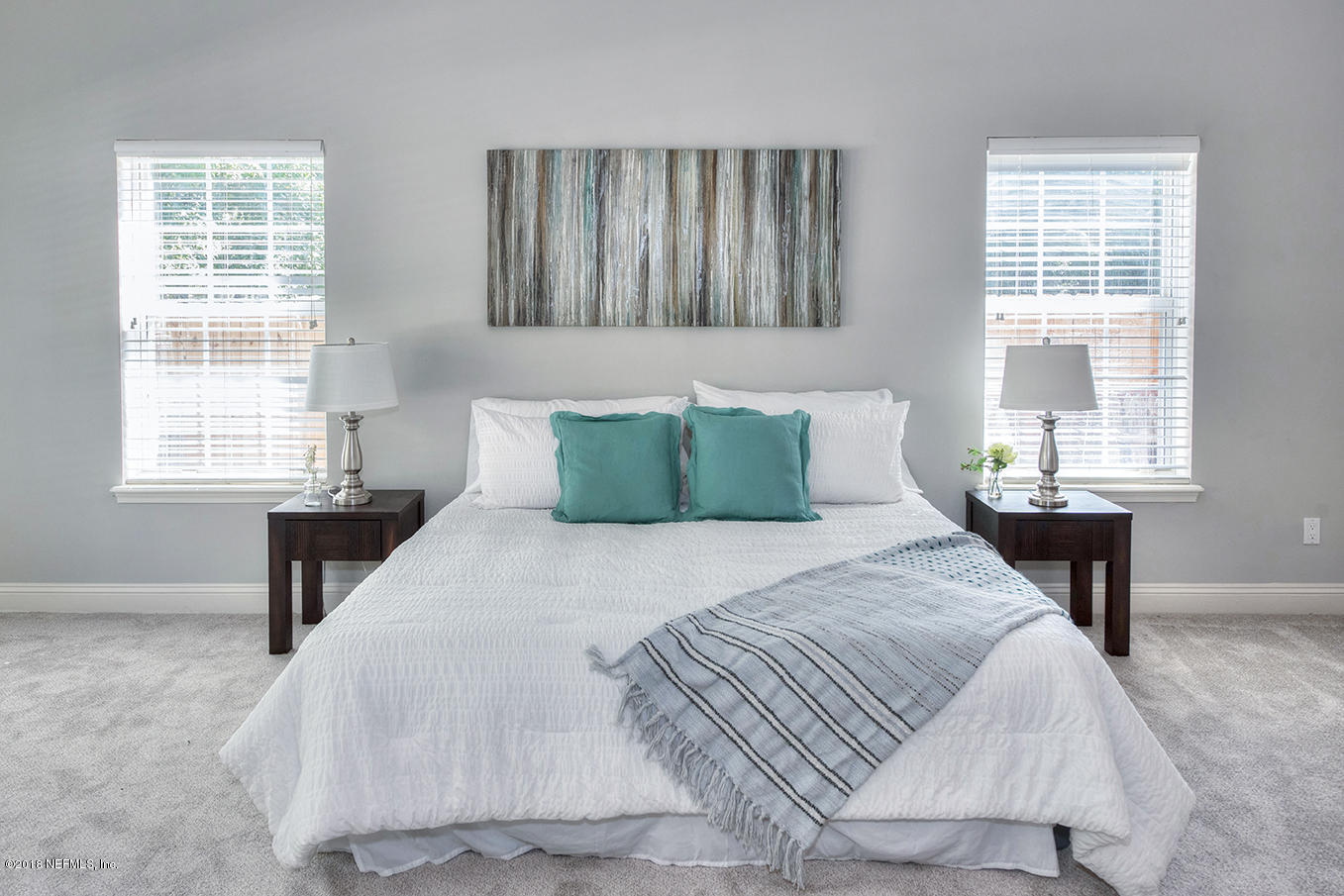 14511 Mandarin Road Jacksonville, FL 32223 - Photo 68 of 91 a bedroom with a bed a table and a window