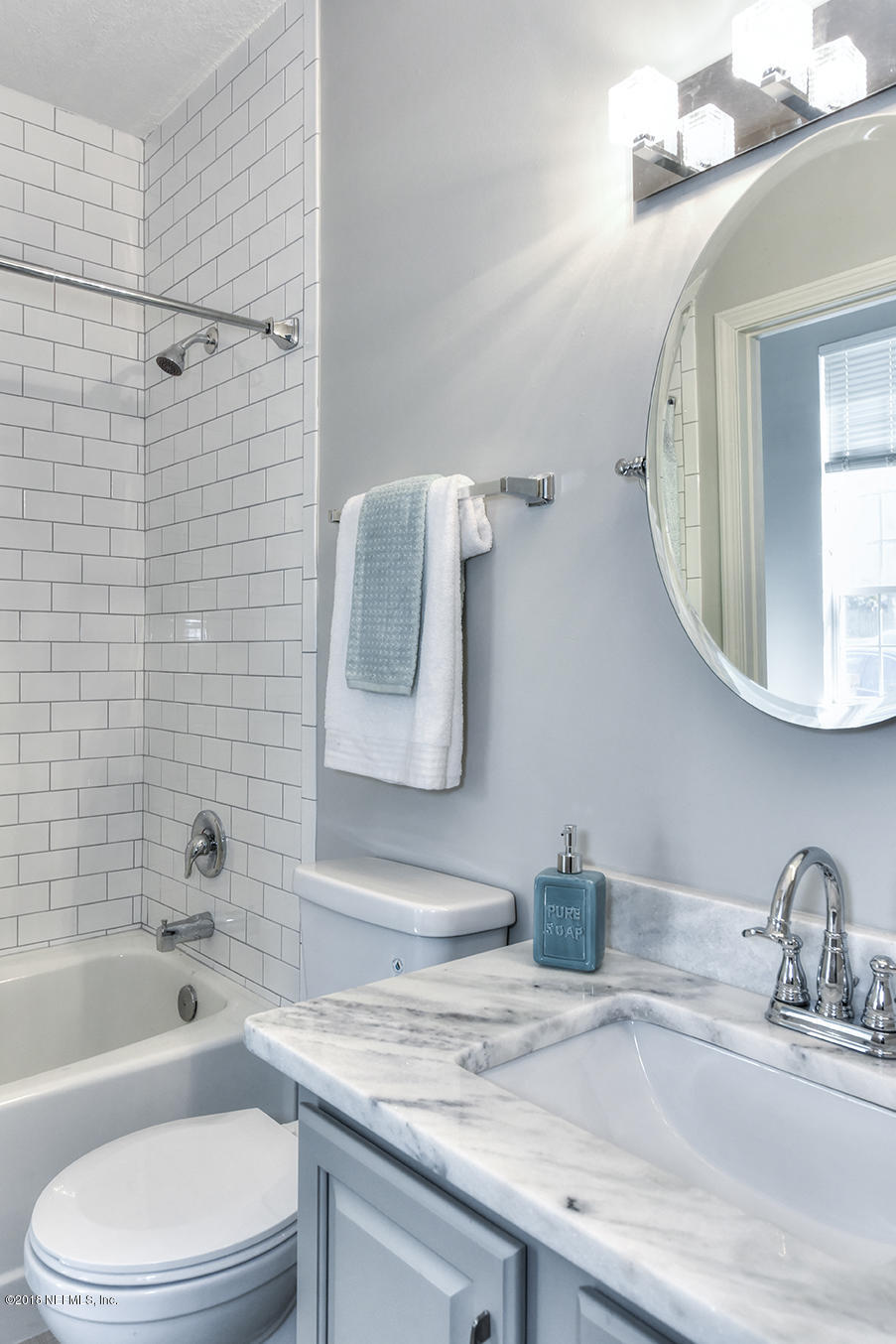 14511 Mandarin Road Jacksonville, FL 32223 - Photo 69 of 91 a bathroom with a granite countertop sink toilet and shower