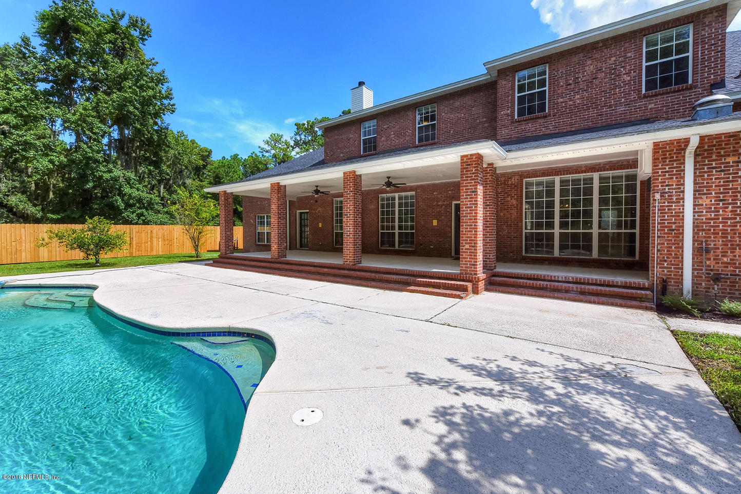 14511 Mandarin Road Jacksonville, FL 32223 - Photo 87 of 91 a front view of a house with a yard