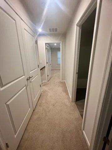 an empty room with a windows