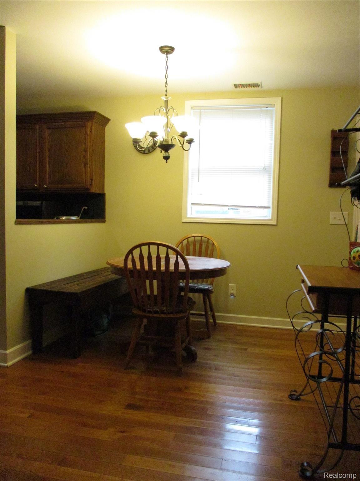19215 Inkster Road Livonia, MI 48152 - Photo 23 of 43 DINING ROOM HARDWOOD FLOOR