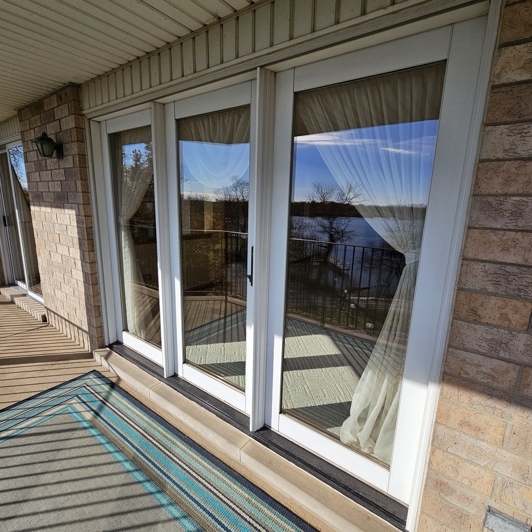 3620 186th Street, Unit 405 Lansing, IL 60438 - Photo 16 of 36 a view of a balcony door