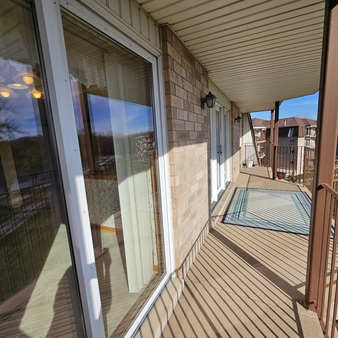 3620 186th Street, Unit 405 Lansing, IL 60438 - Photo 33 of 36 a view of a balcony