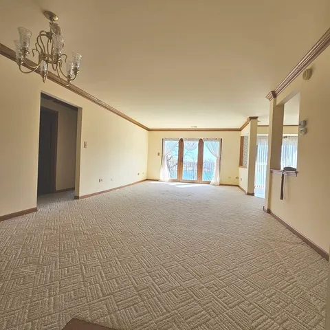 a view of big room with windows