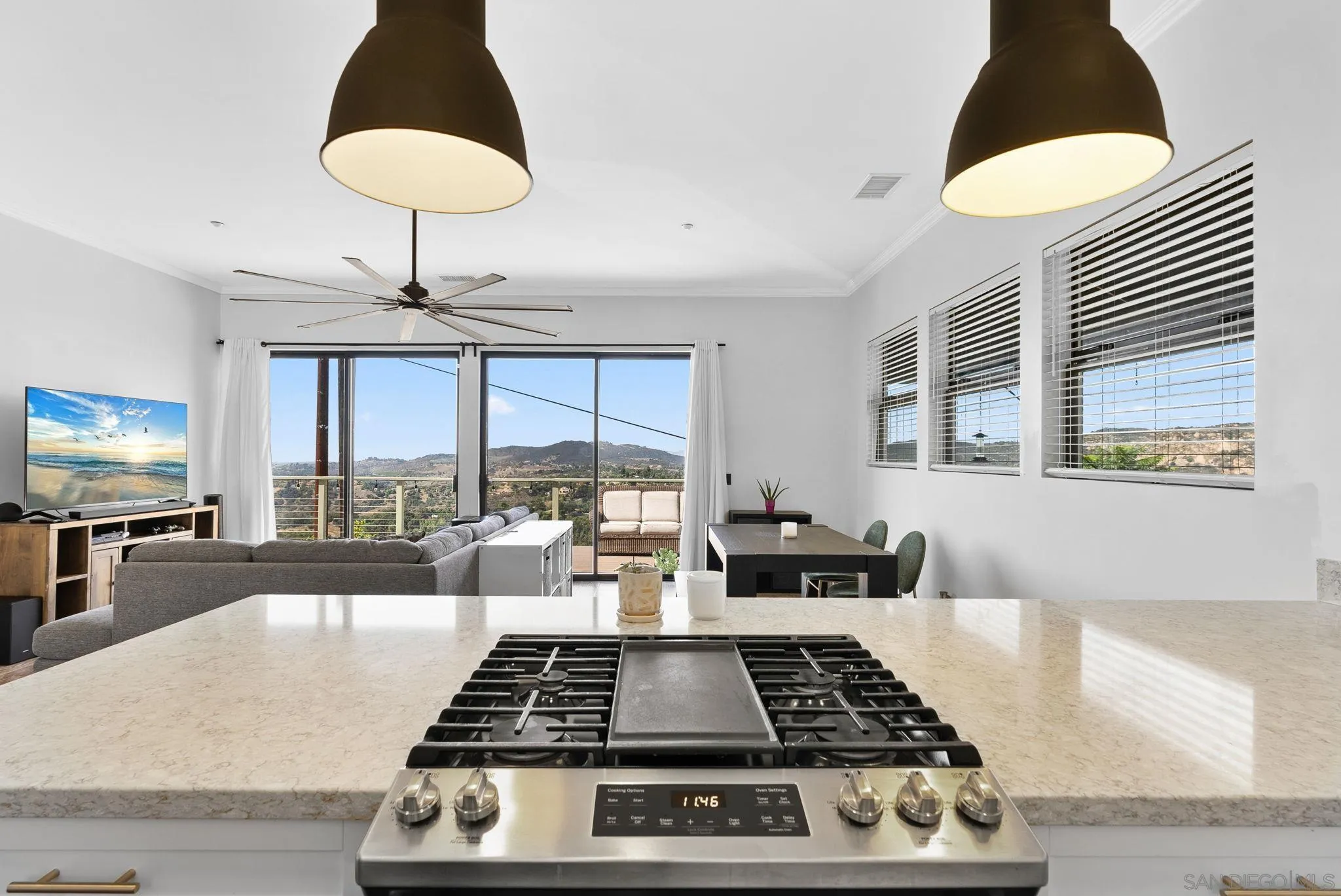 5521 Rainbow Heights Road Fallbrook, CA 92028 - Photo 11 of 36 a kitchen with a stove and a large window