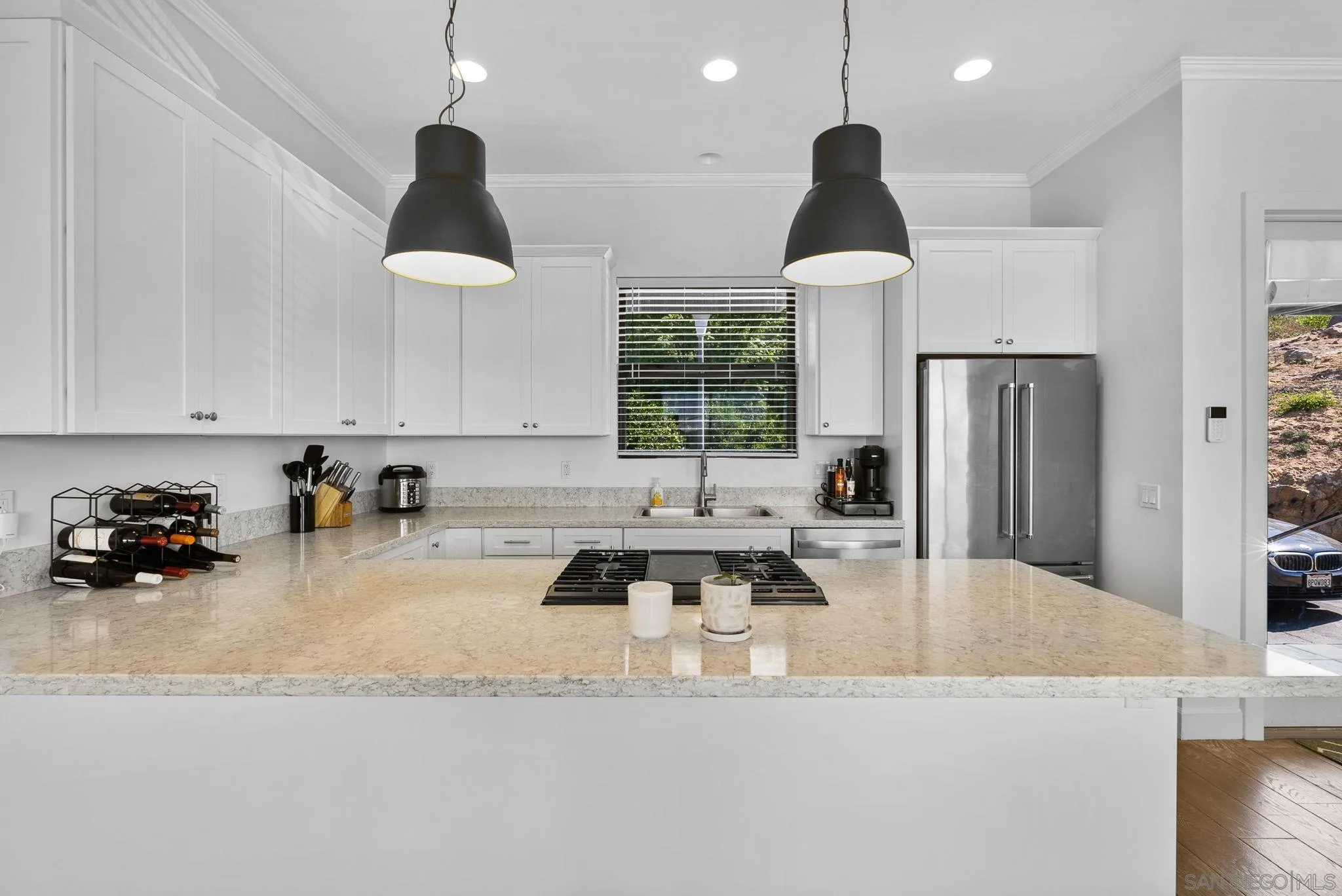 5521 Rainbow Heights Road Fallbrook, CA 92028 - Photo 12 of 36 a kitchen with stainless steel appliances granite countertop a sink a stove and a refrigerator