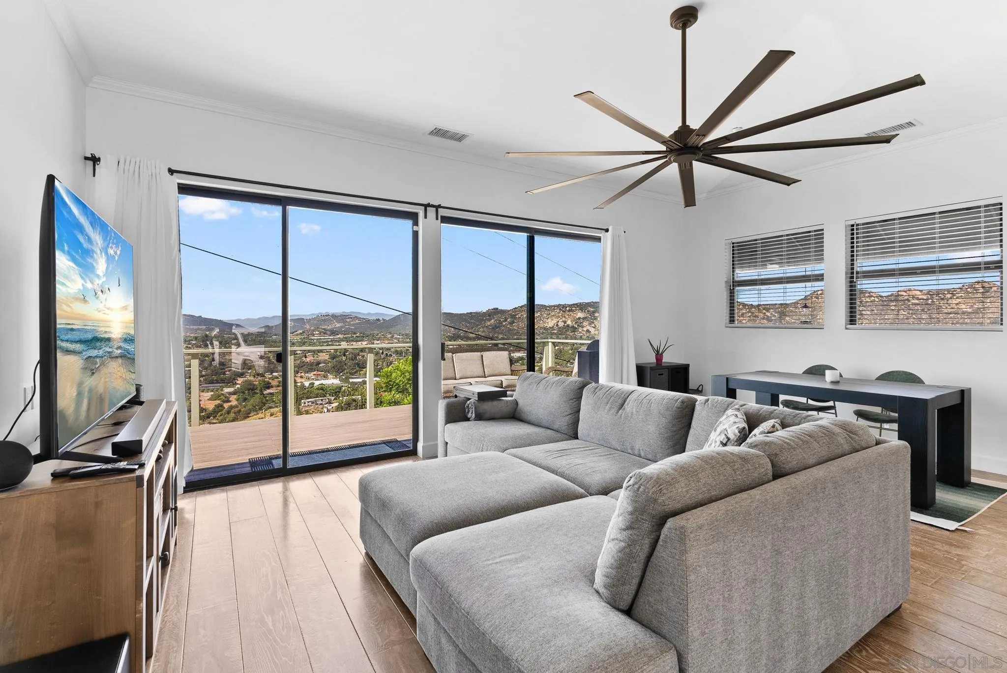 5521 Rainbow Heights Road Fallbrook, CA 92028 - Photo 14 of 36 a living room with furniture and a large window