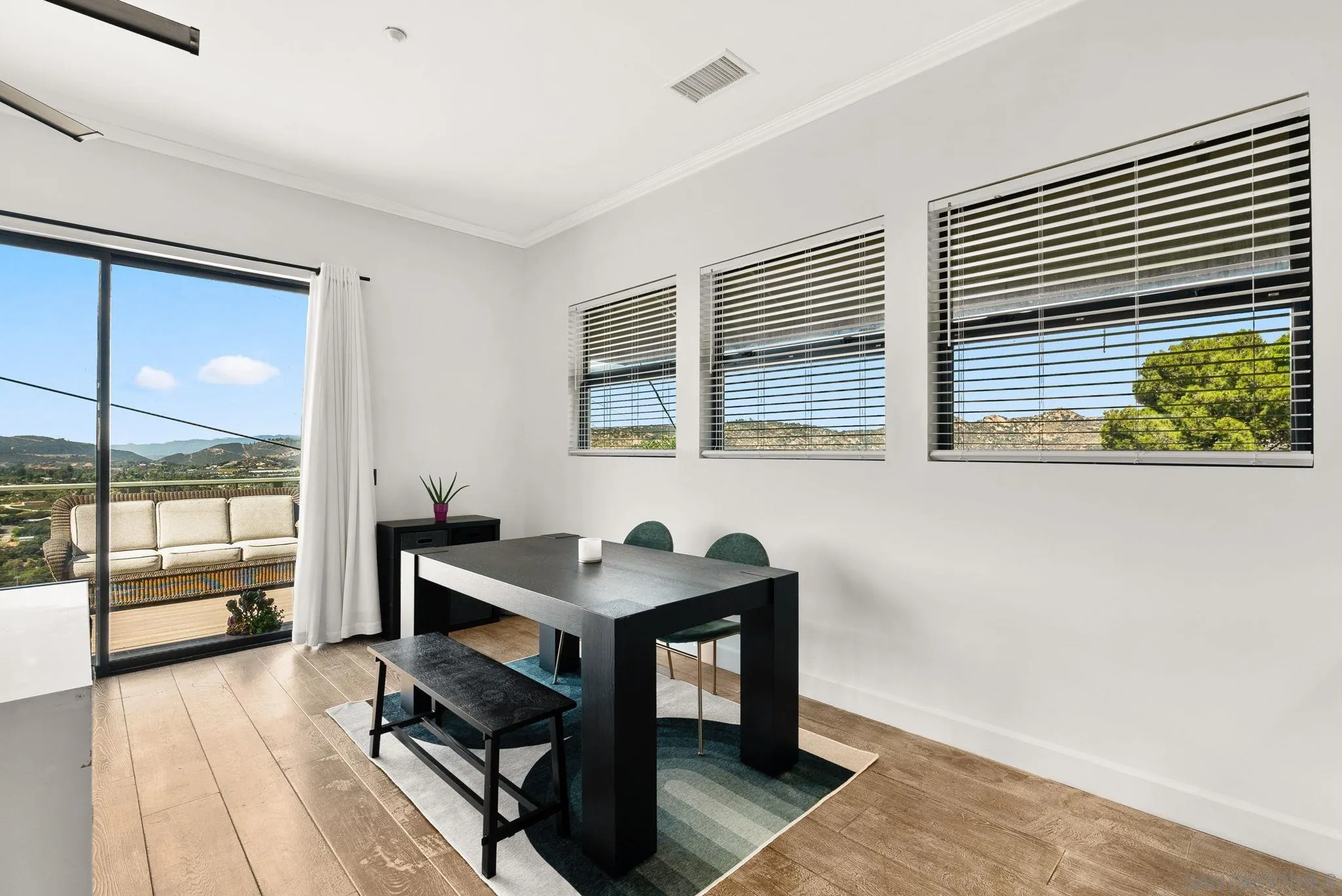5521 Rainbow Heights Road Fallbrook, CA 92028 - Photo 15 of 36 a view of a workspace with furniture and a window