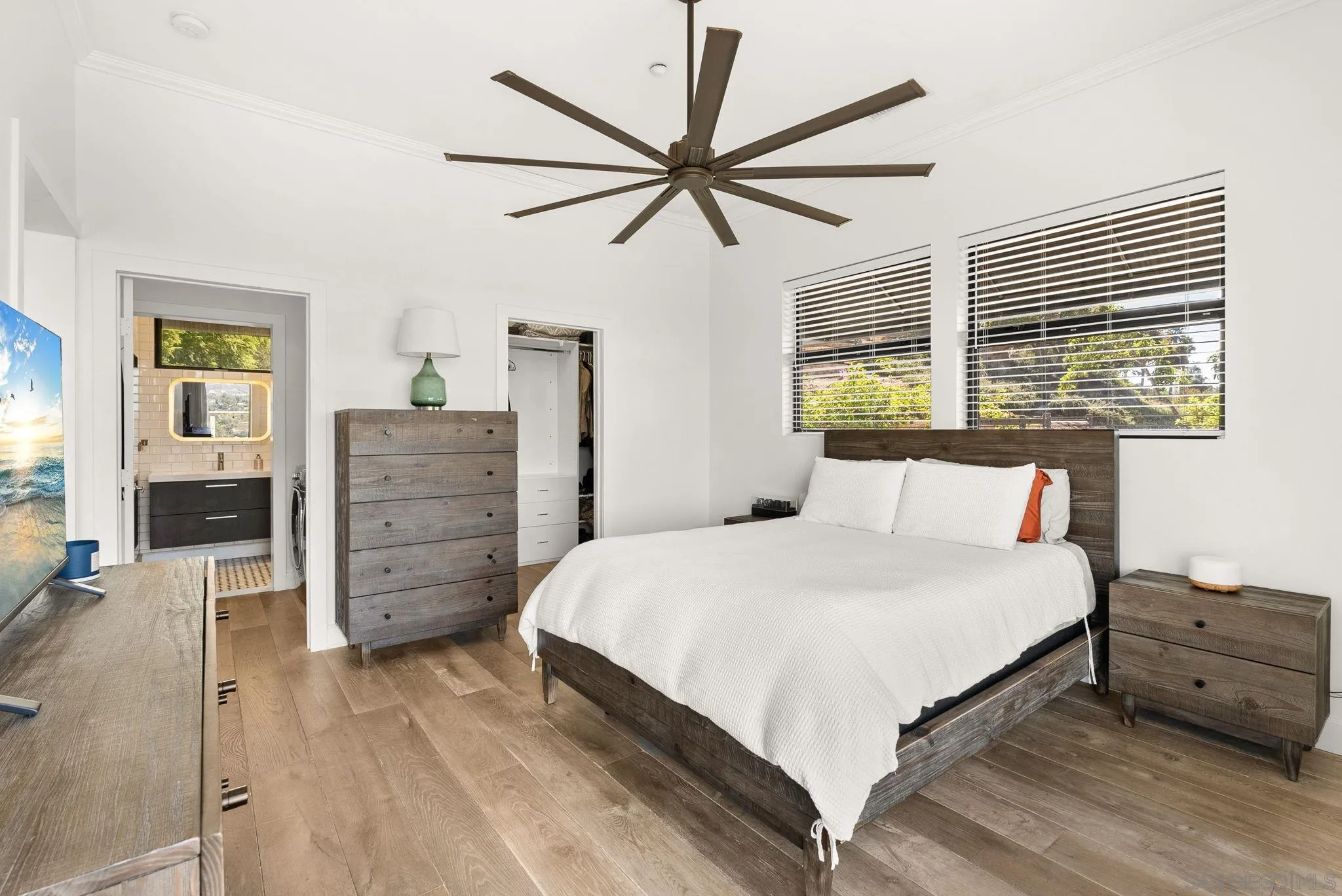 5521 Rainbow Heights Road Fallbrook, CA 92028 - Photo 24 of 36 a bedroom with a bed and a dresser