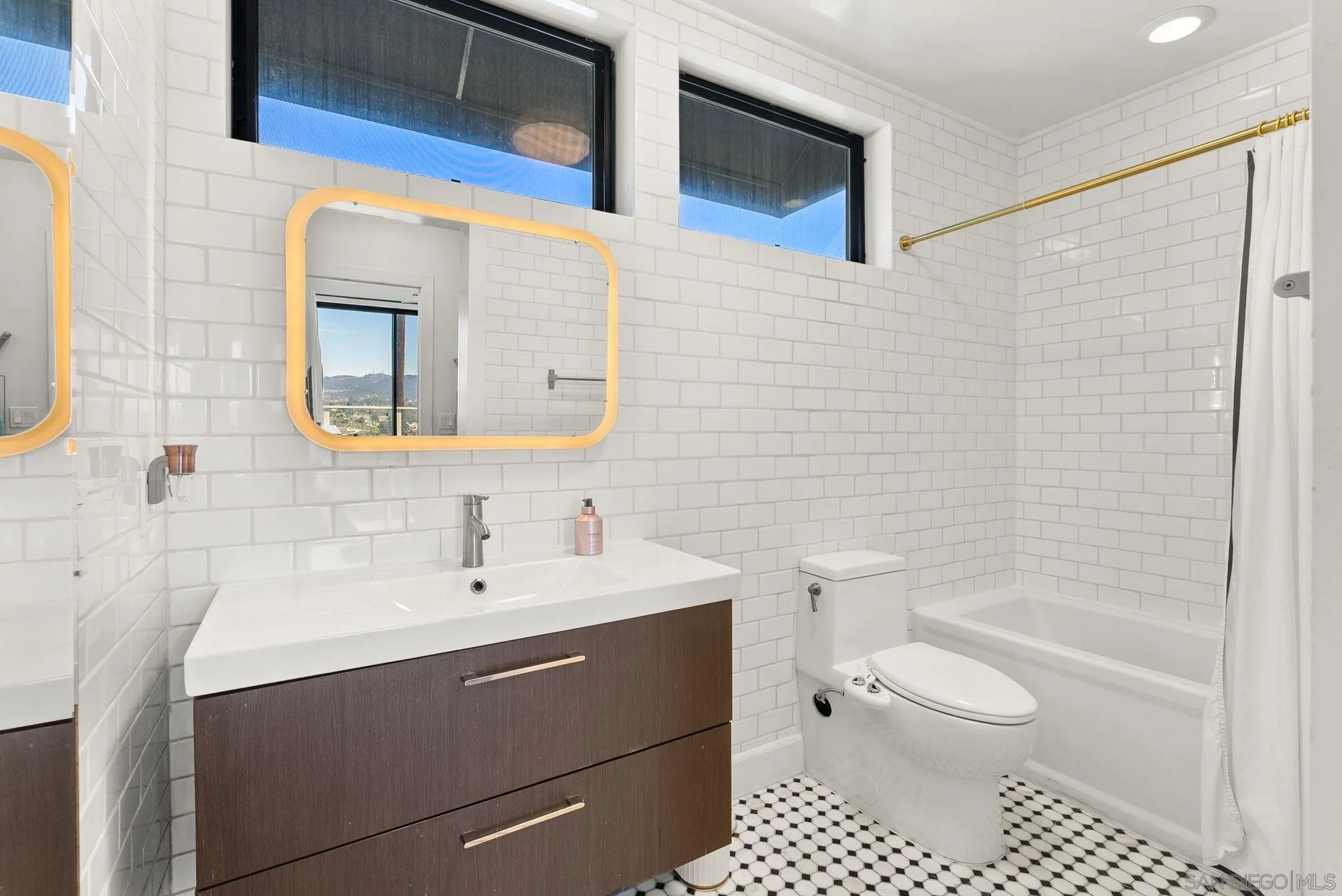 5521 Rainbow Heights Road Fallbrook, CA 92028 - Photo 27 of 36 a bathroom with a sink a toilet and shower