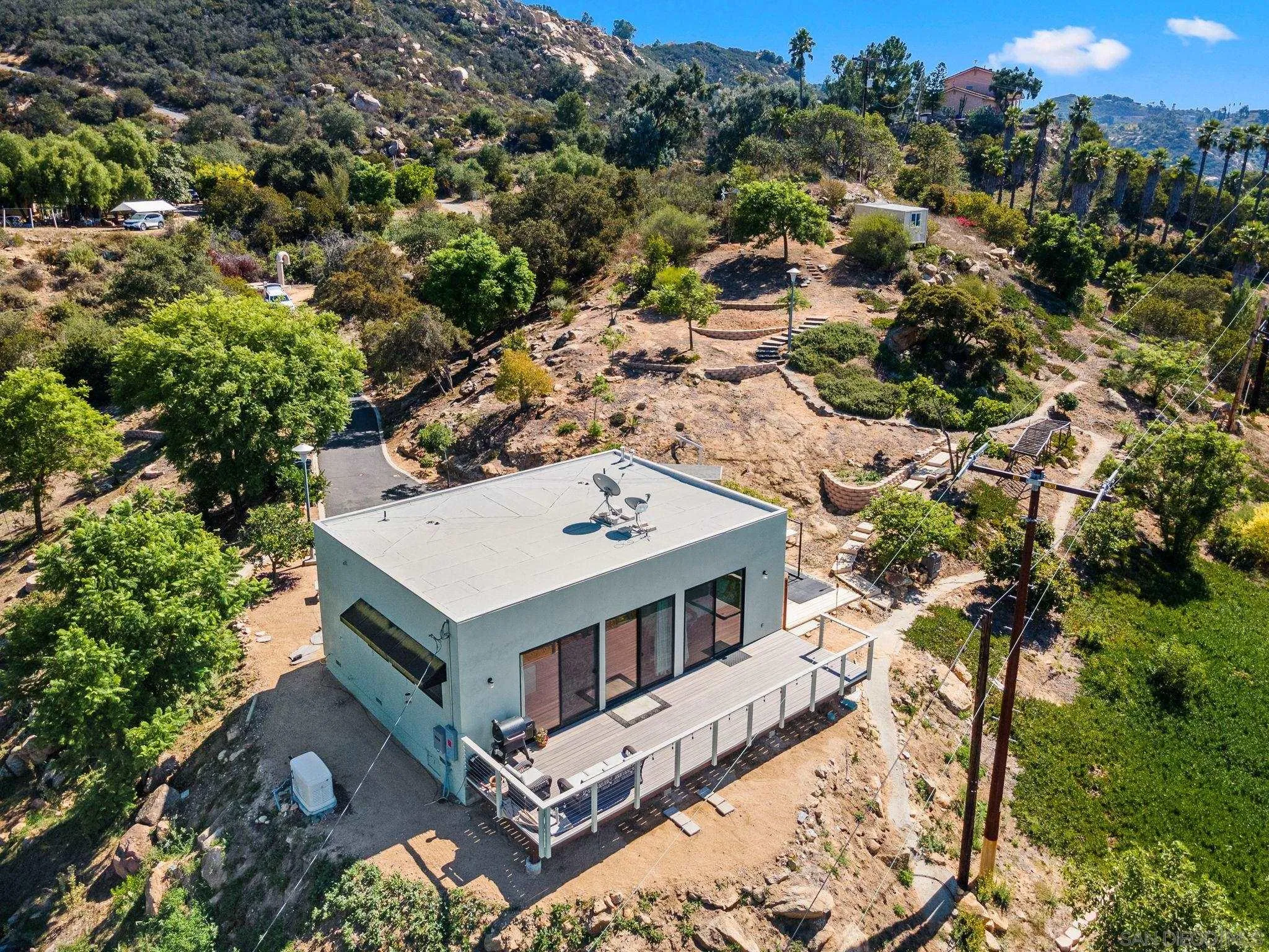 5521 Rainbow Heights Road Fallbrook, CA 92028 - Photo 29 of 36 an aerial view of a house with a yard