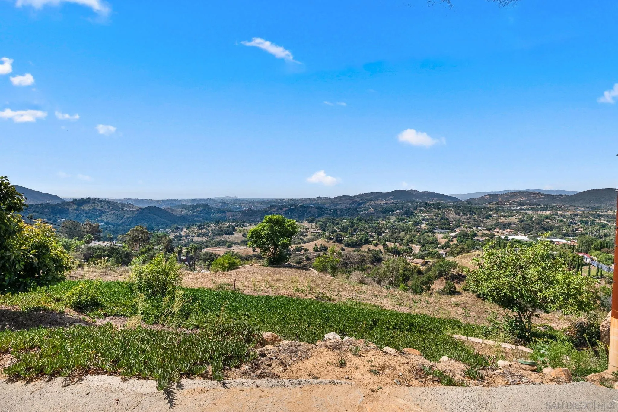 5521 Rainbow Heights Road Fallbrook, CA 92028 - Photo 36 of 36 a view of a city with a mountain in the background