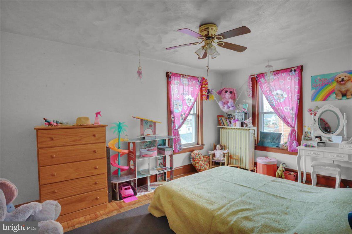 136 West Elm Street Reading, PA 19607 - Photo 11 of 23 a bedroom with a bed and cabinets
