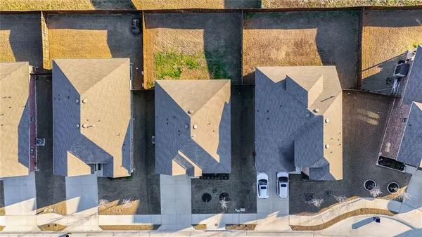 a bathroom with a sink mirror and vanity