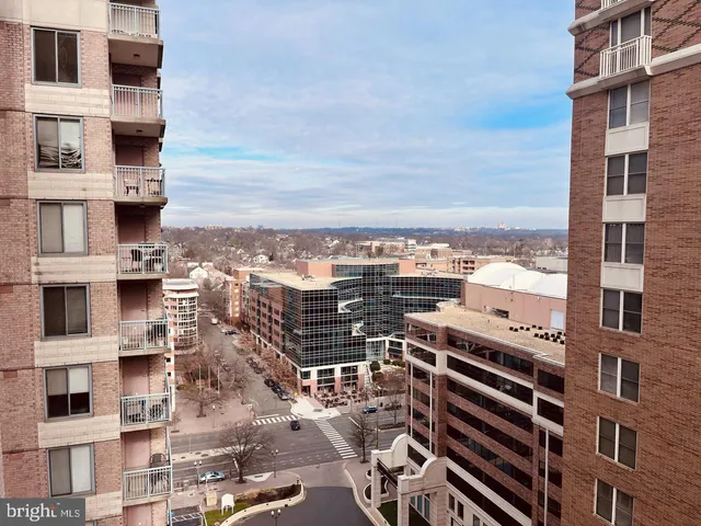 a kitchen with stainless steel appliances a refrigerator a stove a microwave and cabinets
