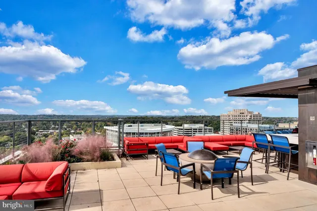 a kitchen with a sink cabinets and a window