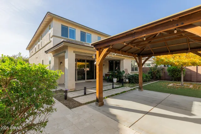 a view of a house with porch and sitting area