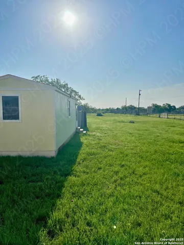 a view of a golf course with a lake