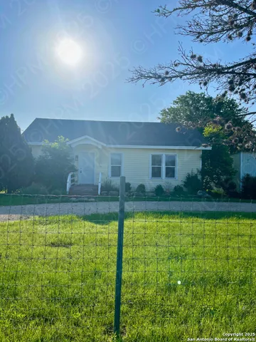 a view of a swimming pool with an outdoor space