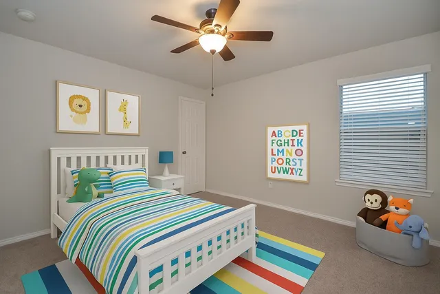 a bedroom with bed and a window