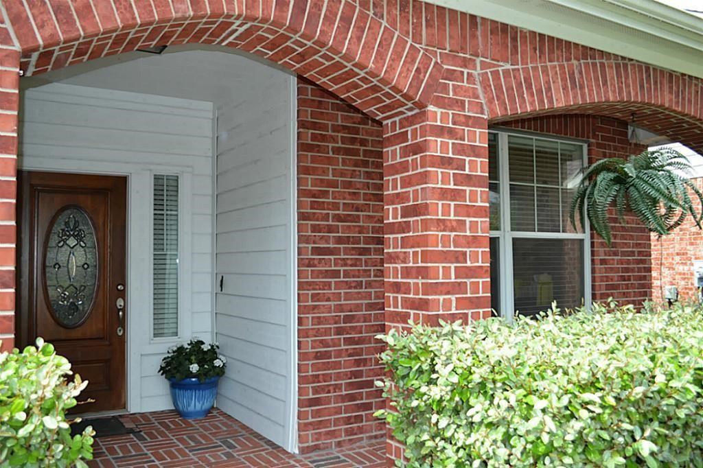 4907 Trailing Clover Court Houston, TX 77084 - Photo 14 of 15 a front view of a house