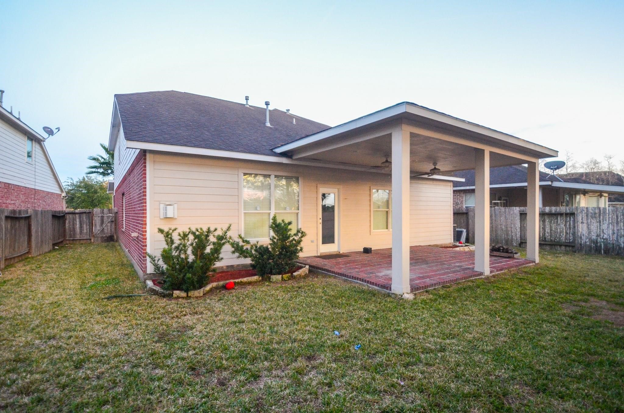 4907 Trailing Clover Court Houston, TX 77084 - Photo 15 of 15 a view of a house with a yard and plants