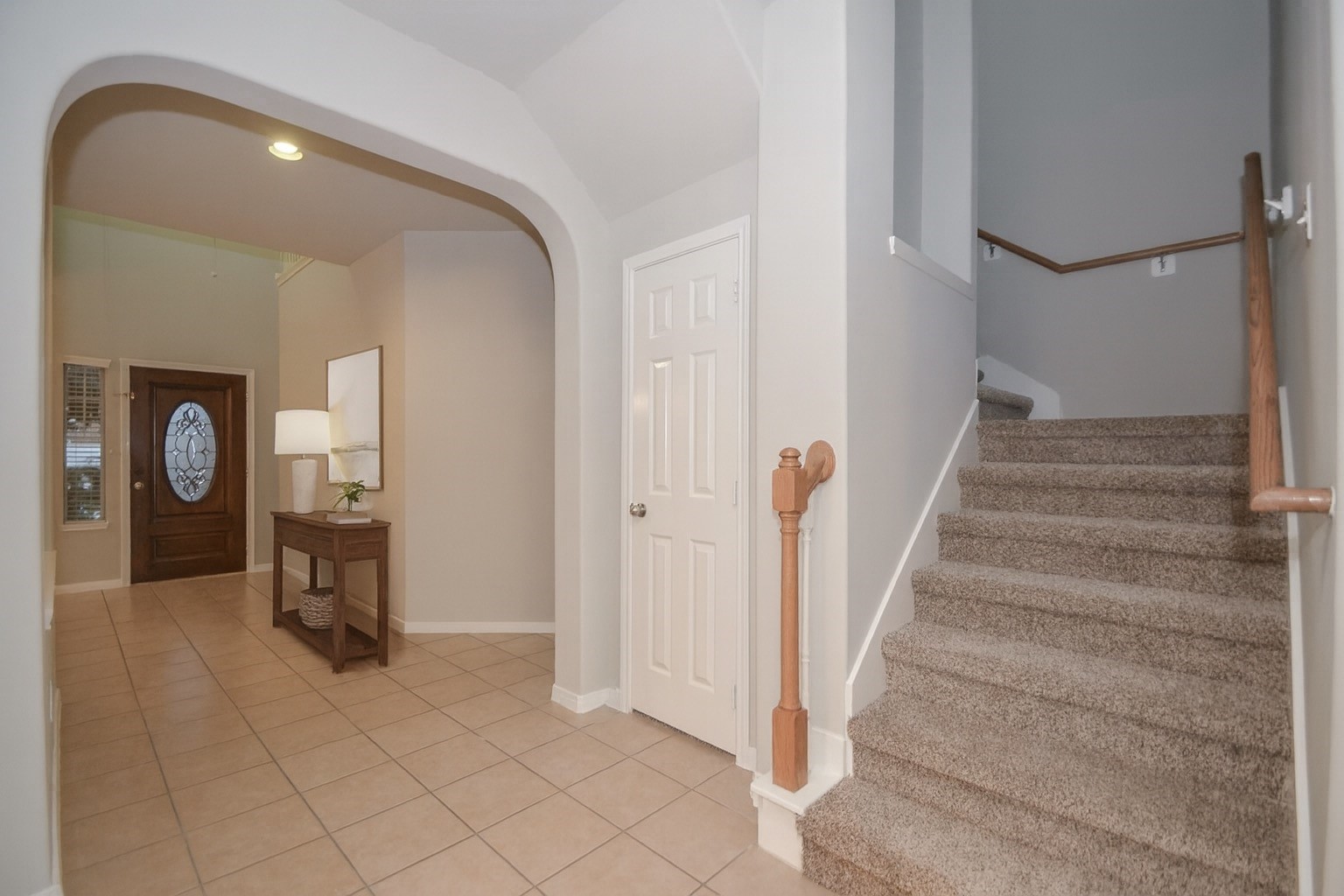 4907 Trailing Clover Court Houston, TX 77084 - Photo 4 of 15 a view of an entryway with a workspace