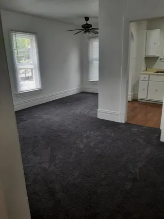 an empty room with windows