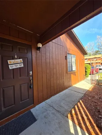 a view of balcony with wooden floor