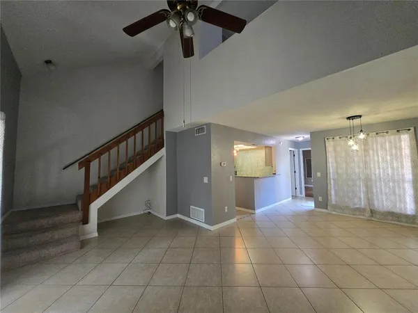 a view of a hallway with staircase
