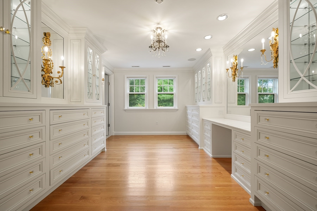10 Wilson's Way Dover, MA 02030 - Photo 23 of 42 a bathroom with a sink a large mirror and a bathtub