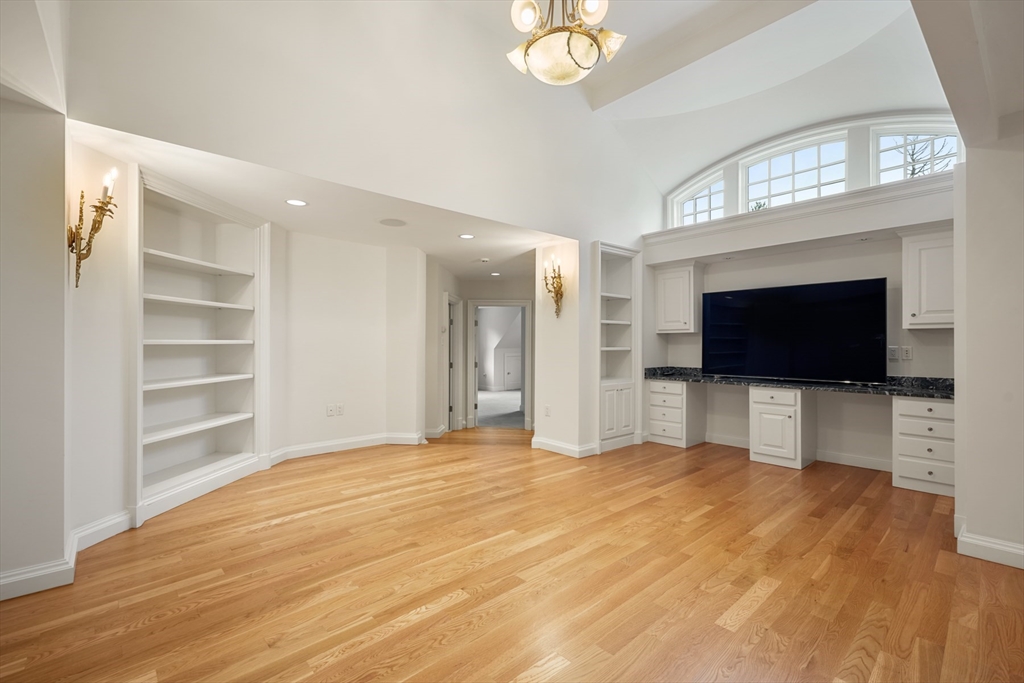 10 Wilson's Way Dover, MA 02030 - Photo 24 of 42 a view of a livingroom with an empty space & a window