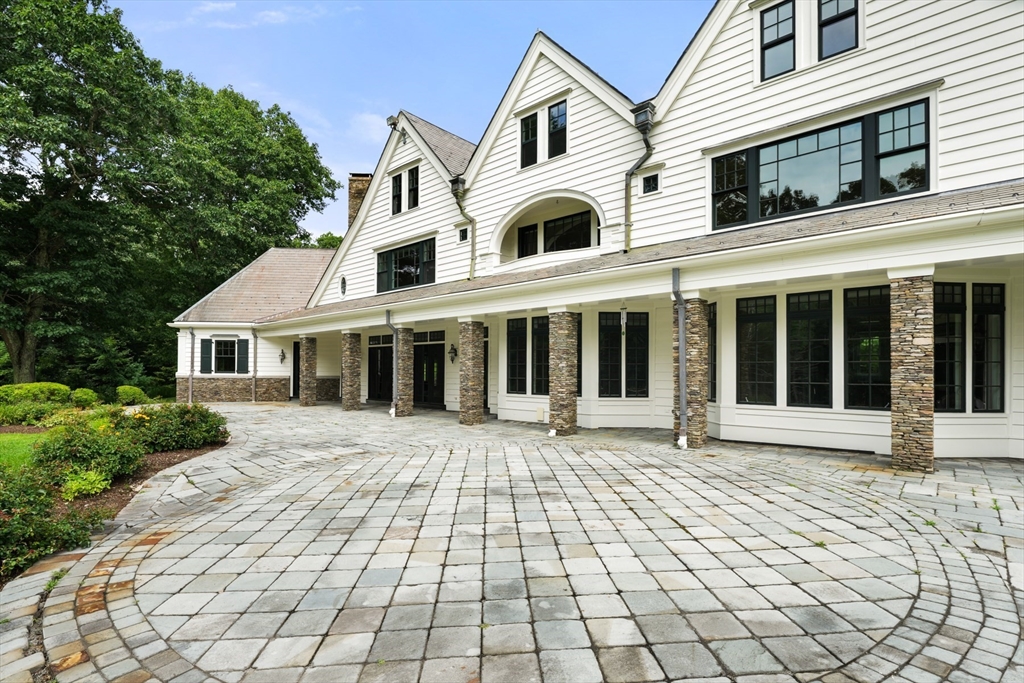 10 Wilson's Way Dover, MA 02030 - Photo 35 of 42 a front view of a house with a yard