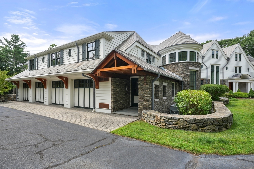 10 Wilson's Way Dover, MA 02030 - Photo 37 of 42 a front view of a house with a garden