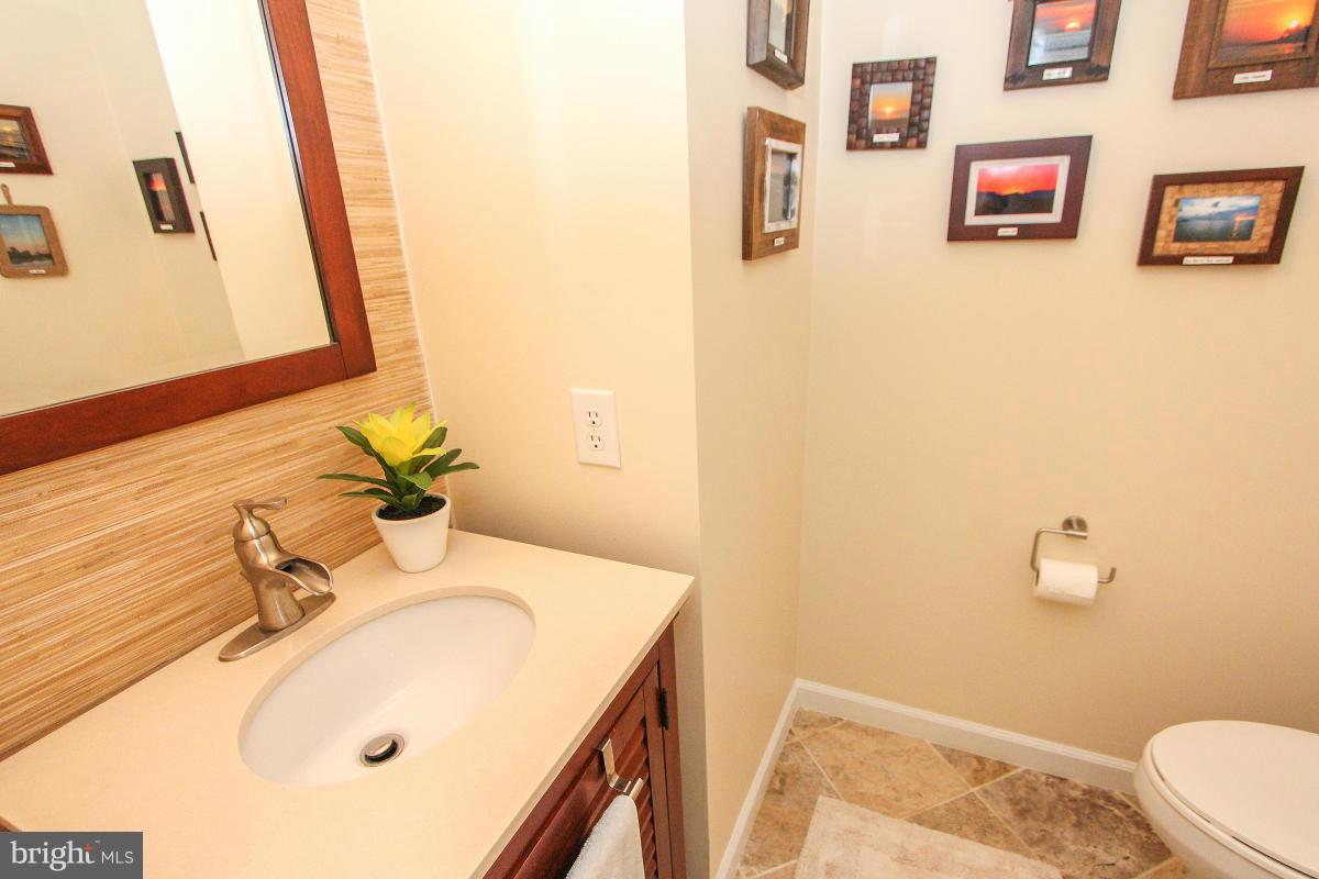 12666 Granite Ridge Drive North Potomac, MD 20878 - Photo 8 of 30 a bathroom with a sink and a mirror