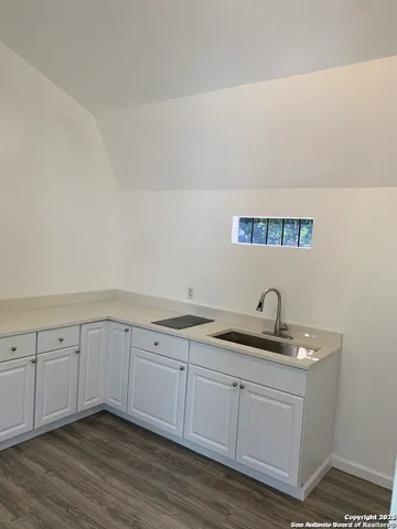 a view of a sink and dishwasher