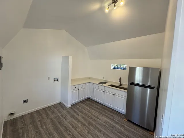 a bathroom with a toilet a sink and a bathtub